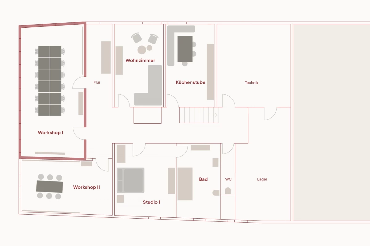 Grundriss eines Gebäudes mit mehreren Räumen wie Workshop 1, Workshop 2, Studio 1, Wohnzimmer, Küche und Bad, dargestellt in einem einfachen, grauen Linienplan auf weißem Hintergrund.